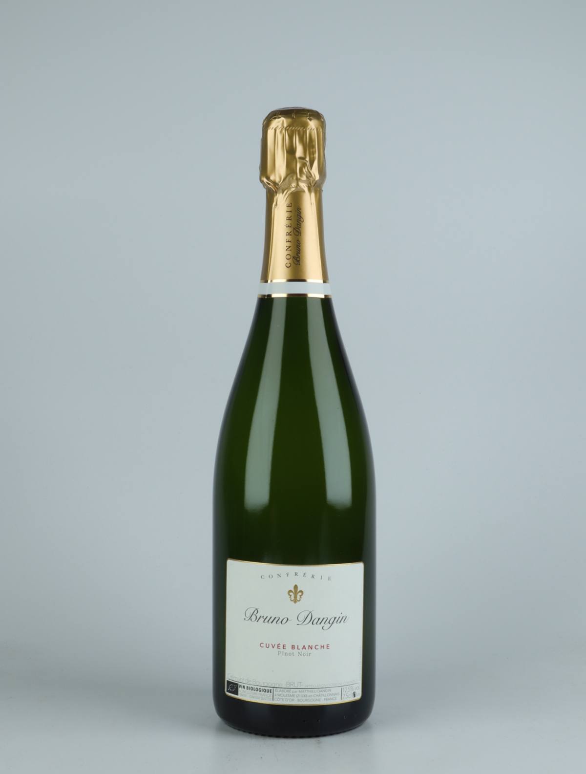 A bottle N.V. Crémant Brut - Cuvée Blanche Sparkling from Domaine Bruno Dangin, Burgundy in France