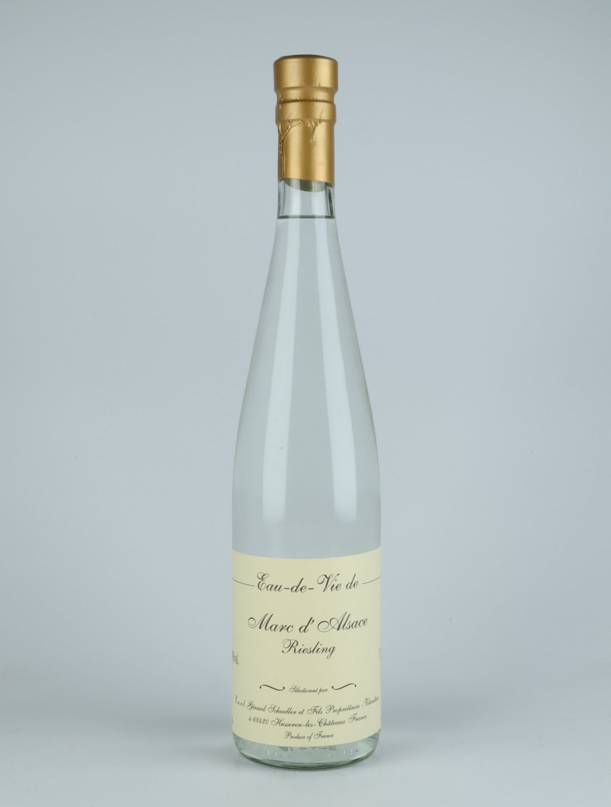 A bottle N.V. Eau de Vie de Marc de Riesling Spirits from Gérard Schueller, Alsace in France