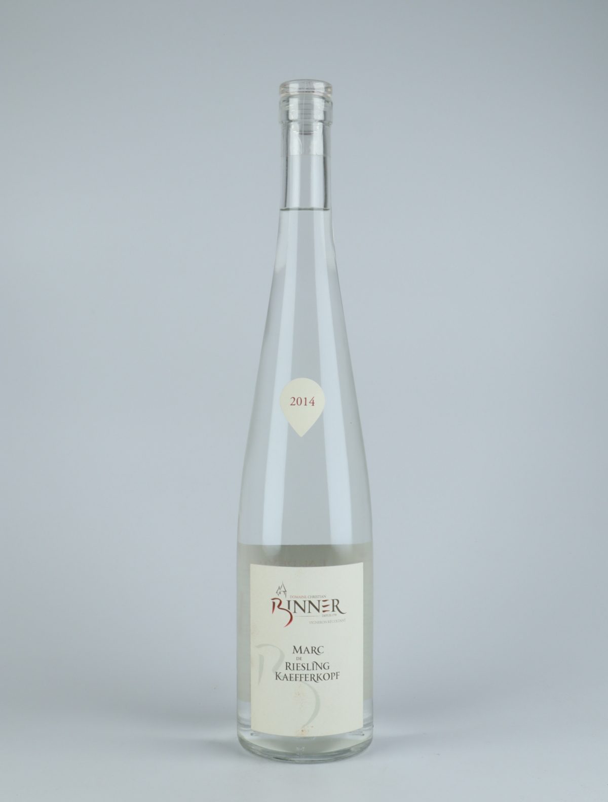 A bottle 2014 Marc de Riesling Kaefferkopf Spirits from Domaine Christian Binner, Alsace in France