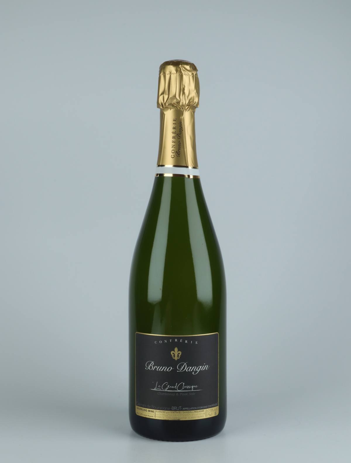 A bottle N.V. Crémant Brut - Le Grande Classique Sparkling from Domaine Bruno Dangin, Burgundy in France
