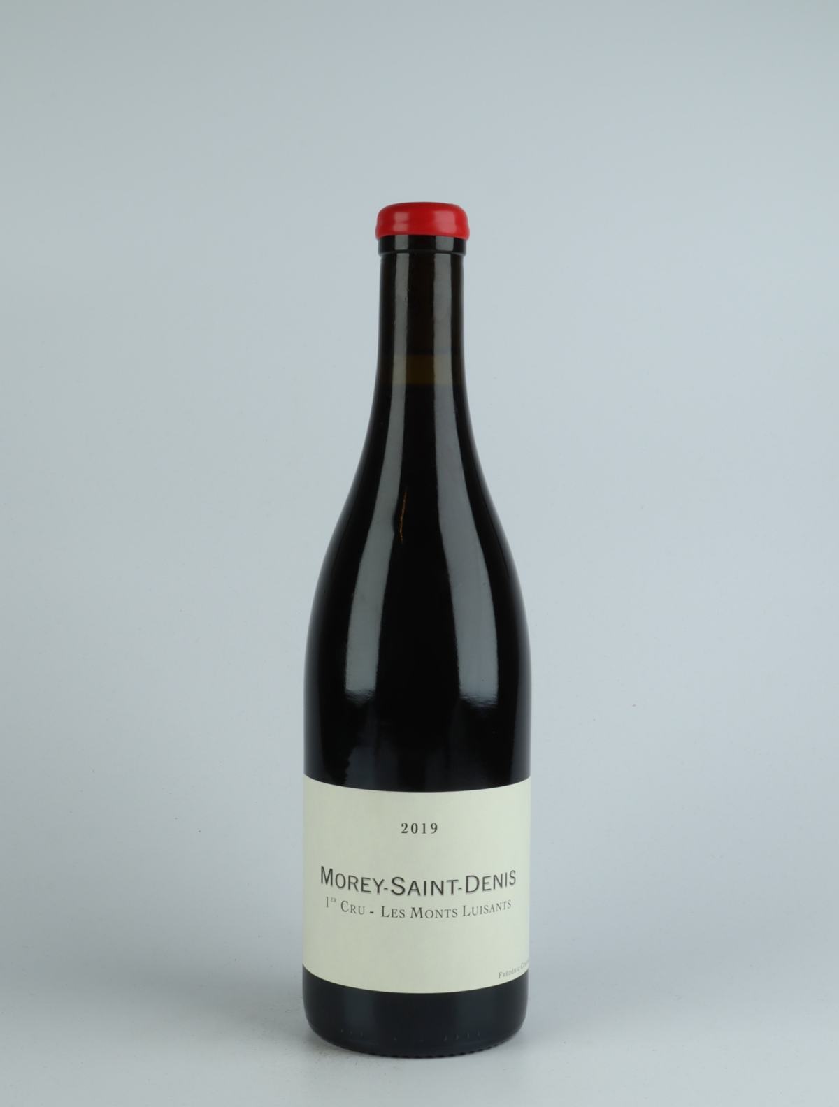 A bottle 2019 Morey Saint Denis 1. Cru - Les Monts Luisants Rødvin from Frédéric Cossard, Bourgogne in Frankrig