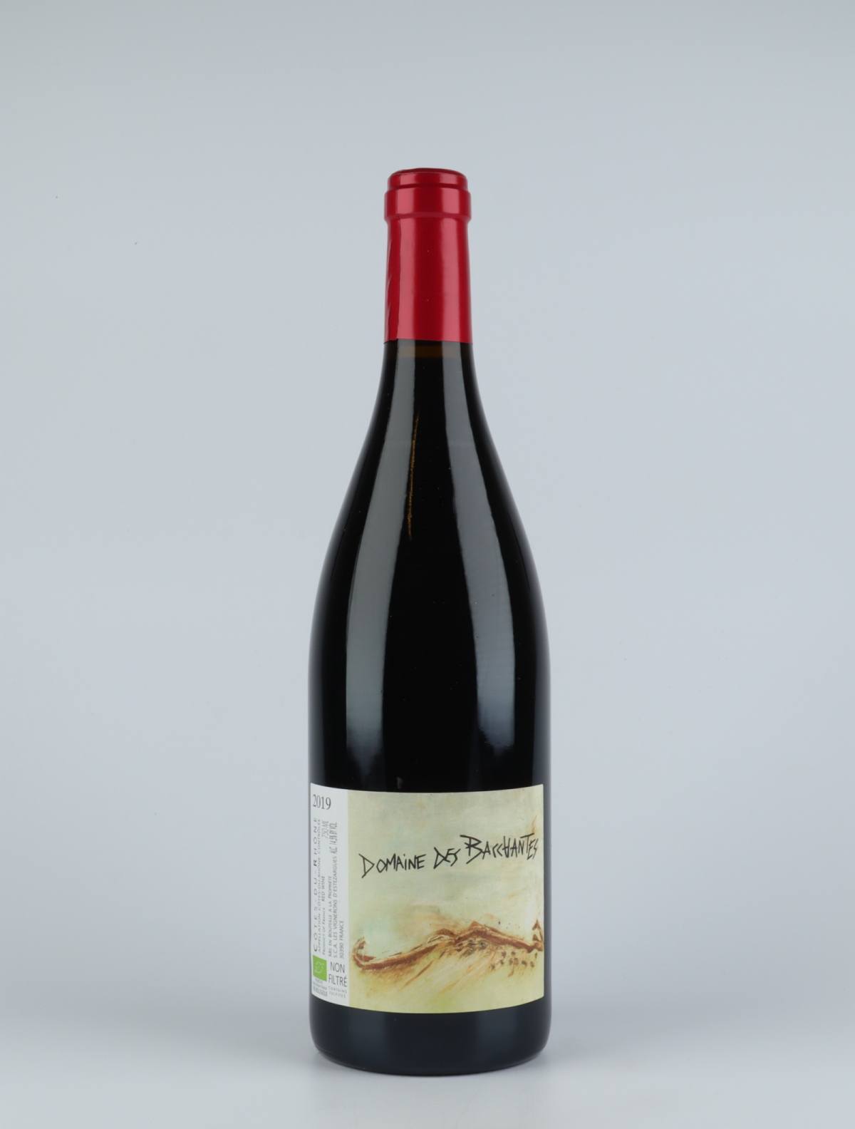 A bottle 2019 Côtes du Rhône - Domaine des Bacchantes Red wine from Les Vignerons d’Estézargues, Rhône in France