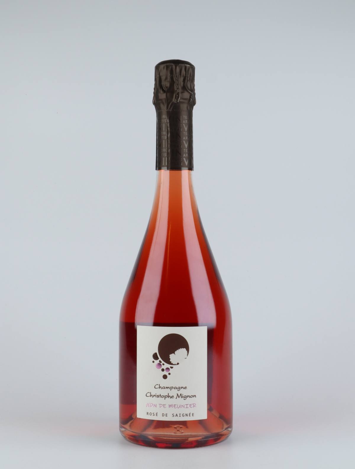 A bottle 2015 ADN de Meunier Saignee Brut Nature Sparkling from Christophe Mignon, Champagne in France