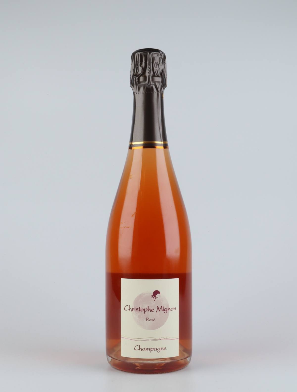 A bottle N.V. Rosé Pur Meunier Mousserende from Christophe Mignon, Champagne in Frankrig