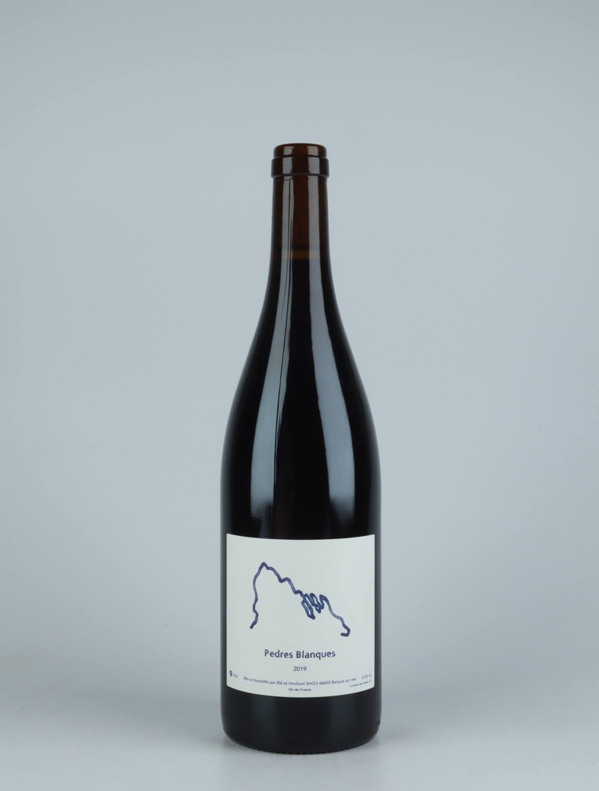 A bottle 2019 Rouge Rødvin from Pedres Blanques, Roussillon in Frankrig