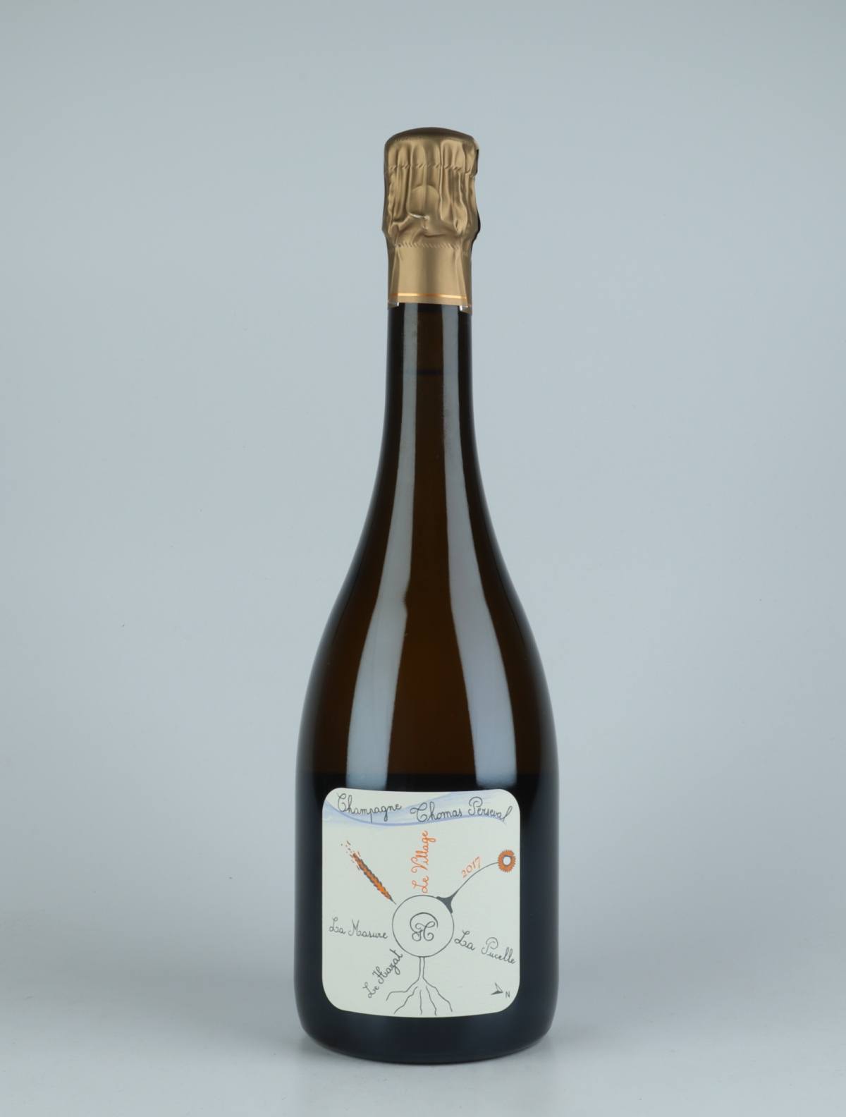 A bottle 2017 Chamery 1. Cru - Le Village Sparkling from Thomas Perseval, Champagne in France