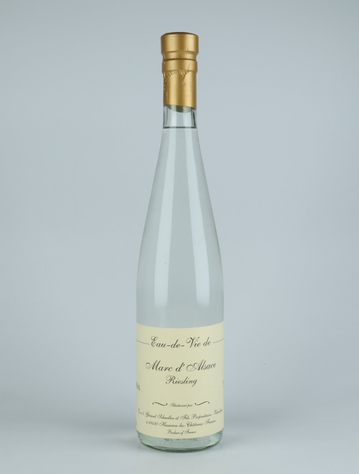 A bottle N.V. Eau de Vie de Marc de Riesling Spiritus from Gérard Schueller, Alsace in Frankrig