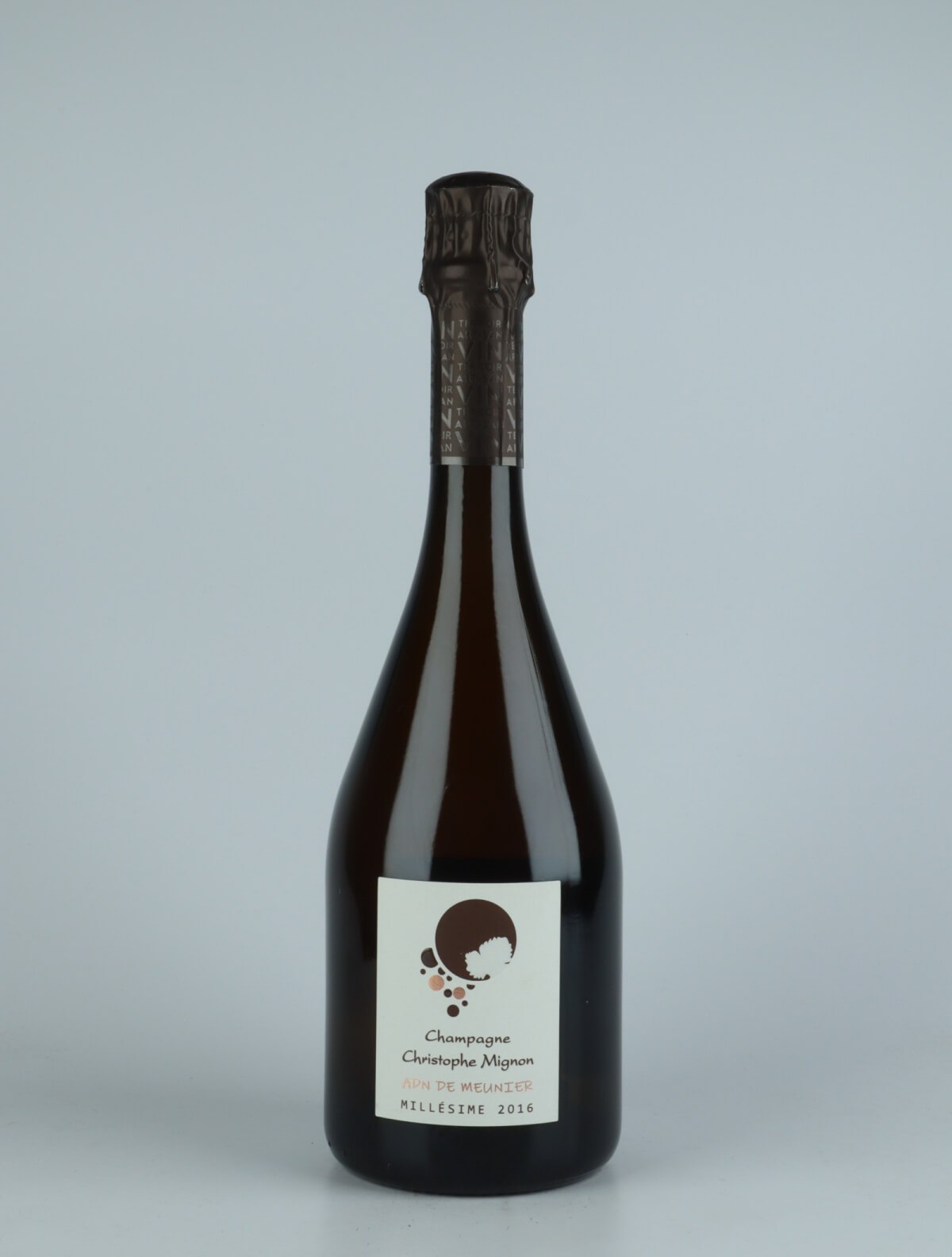 A bottle 2016 ADN de Meunier Millesime Brut Nature Sparkling from Christophe Mignon, Champagne in France