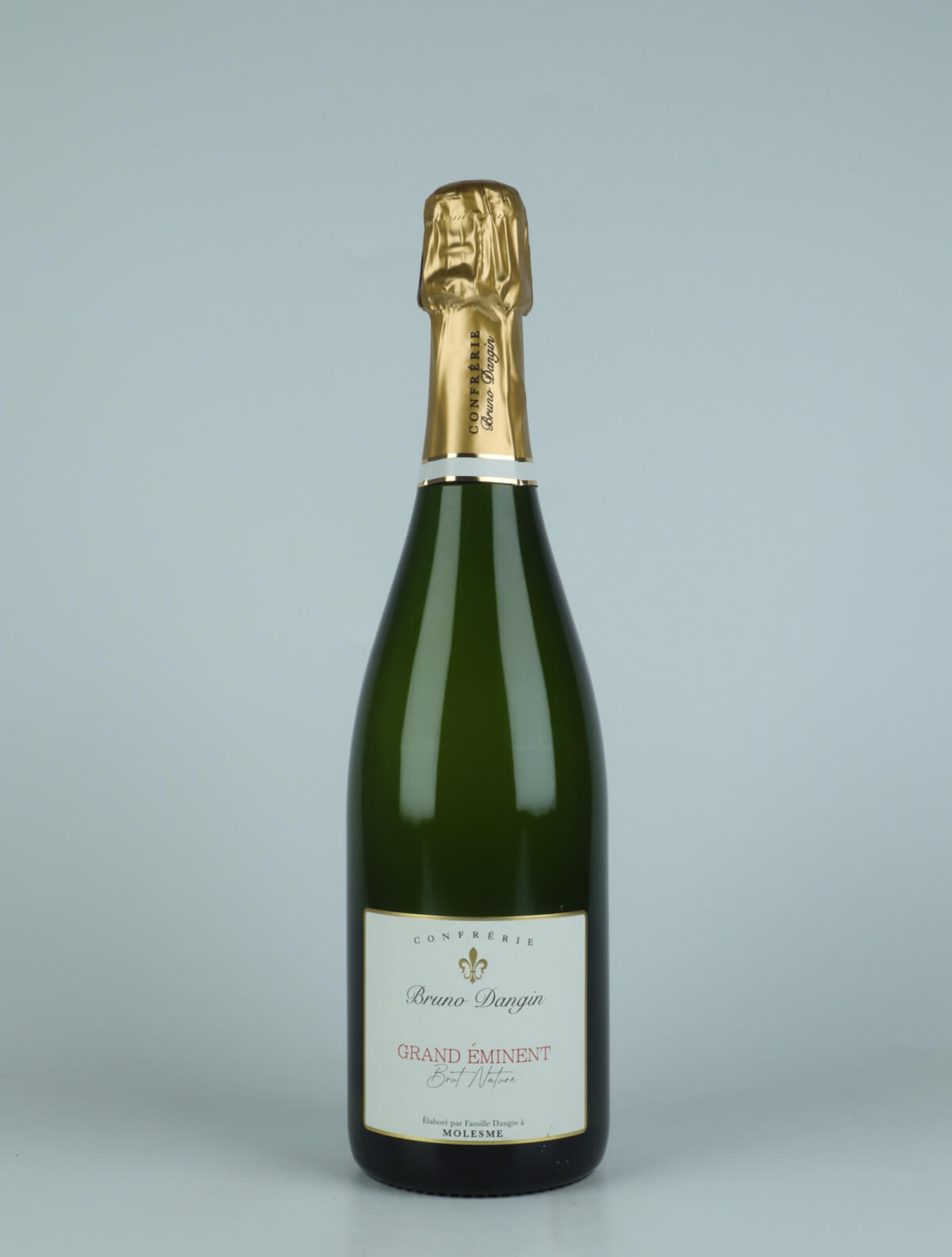 A bottle N.V. Crémant Brut Nature - Grand Éminent Sparkling from Domaine Bruno Dangin, Burgundy in France
