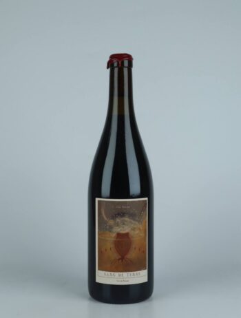 A bottle 2022 Sang de Terre Red wine from Clos Bateau, Beaujolais in France