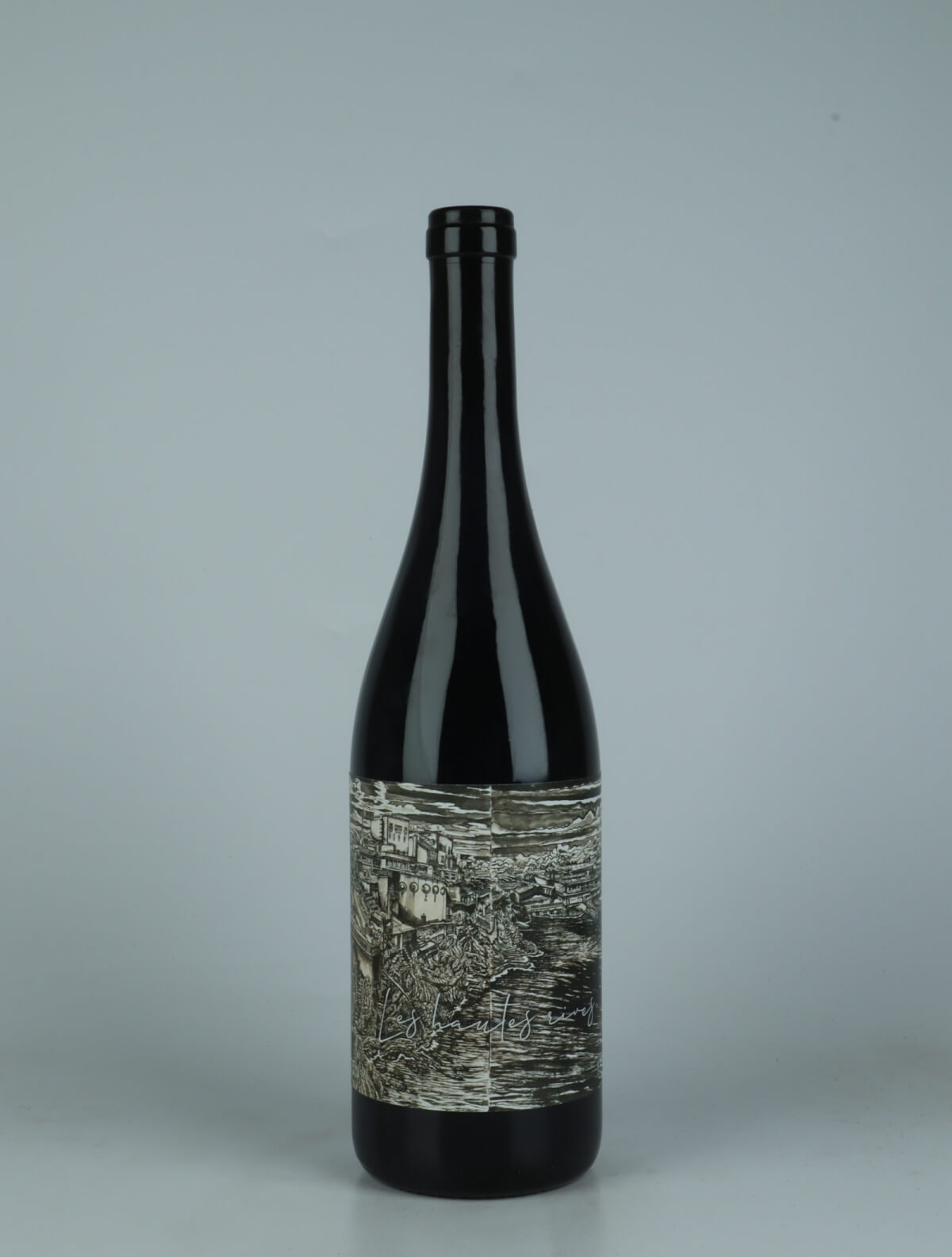 A bottle 2023 Les Hautes Rives Rødvin from Les Vins du Fab, Neuchâtel in Schweiz