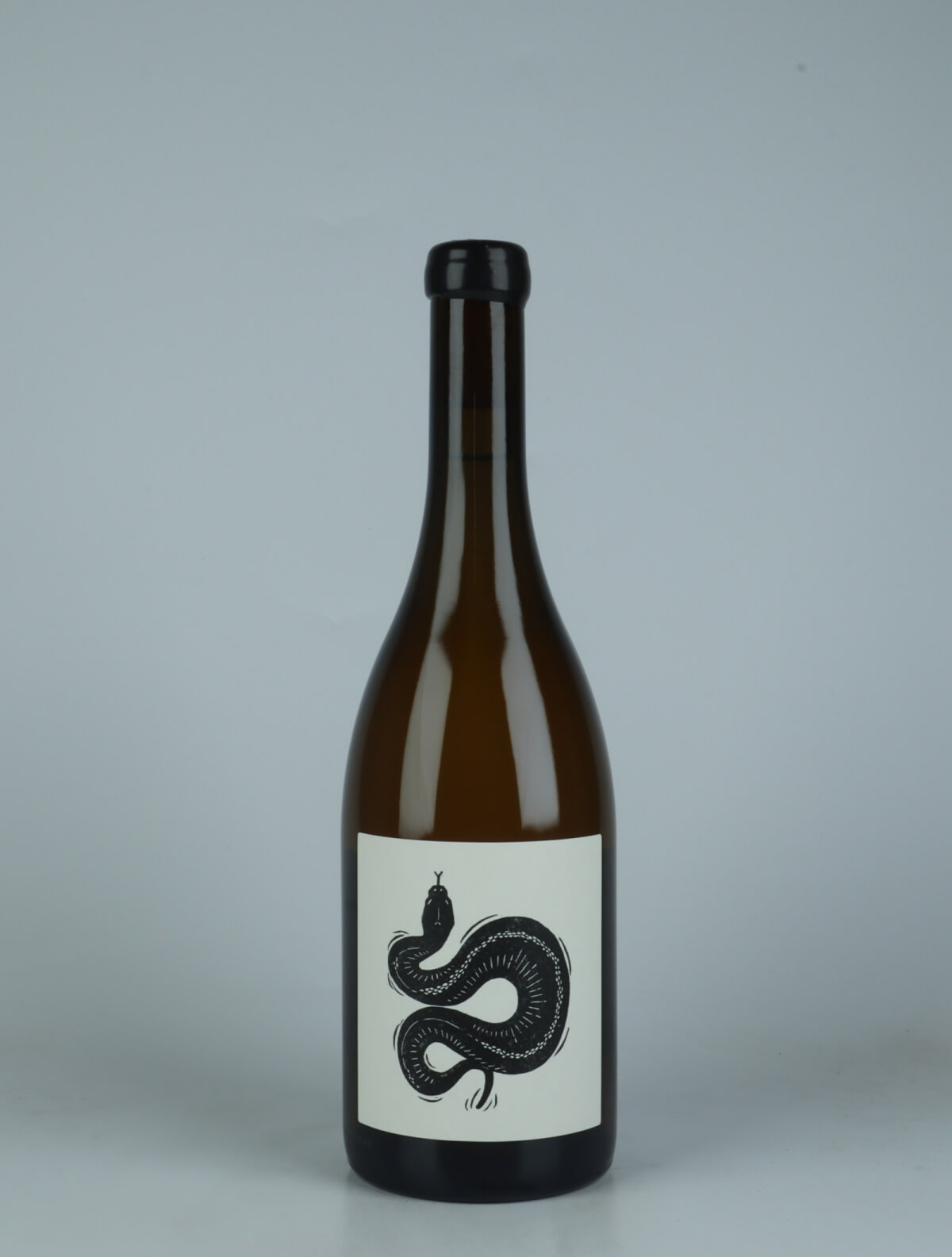 A bottle 2023 Saint Aubin 1er Cru - La Combe - "Shadows" White wine from Vin Noé, Burgundy in France