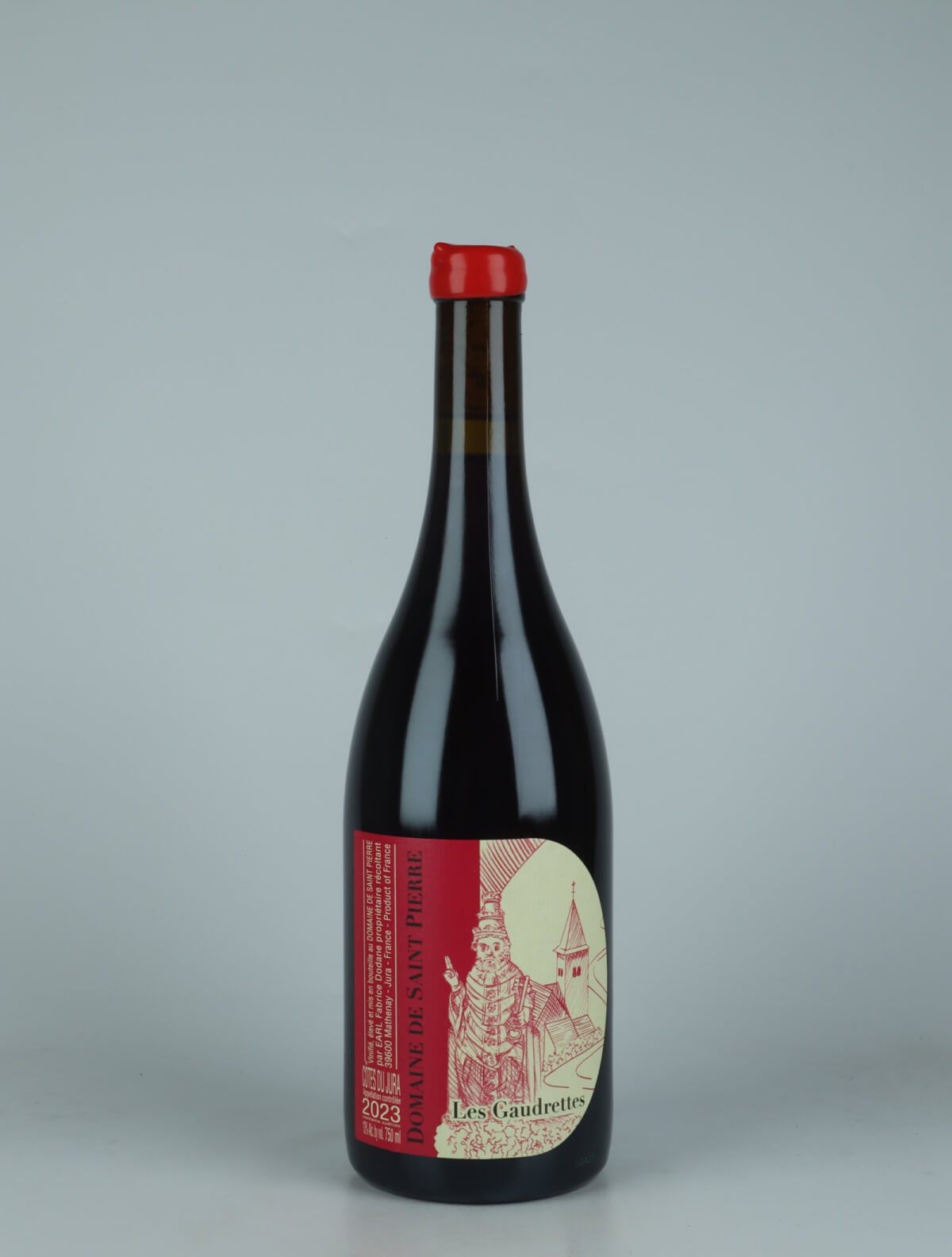 A bottle 2023 Côtes du Jura Rouge - Les Gaudrettes Rødvin from Domaine de Saint Pierre, Jura in Frankrig