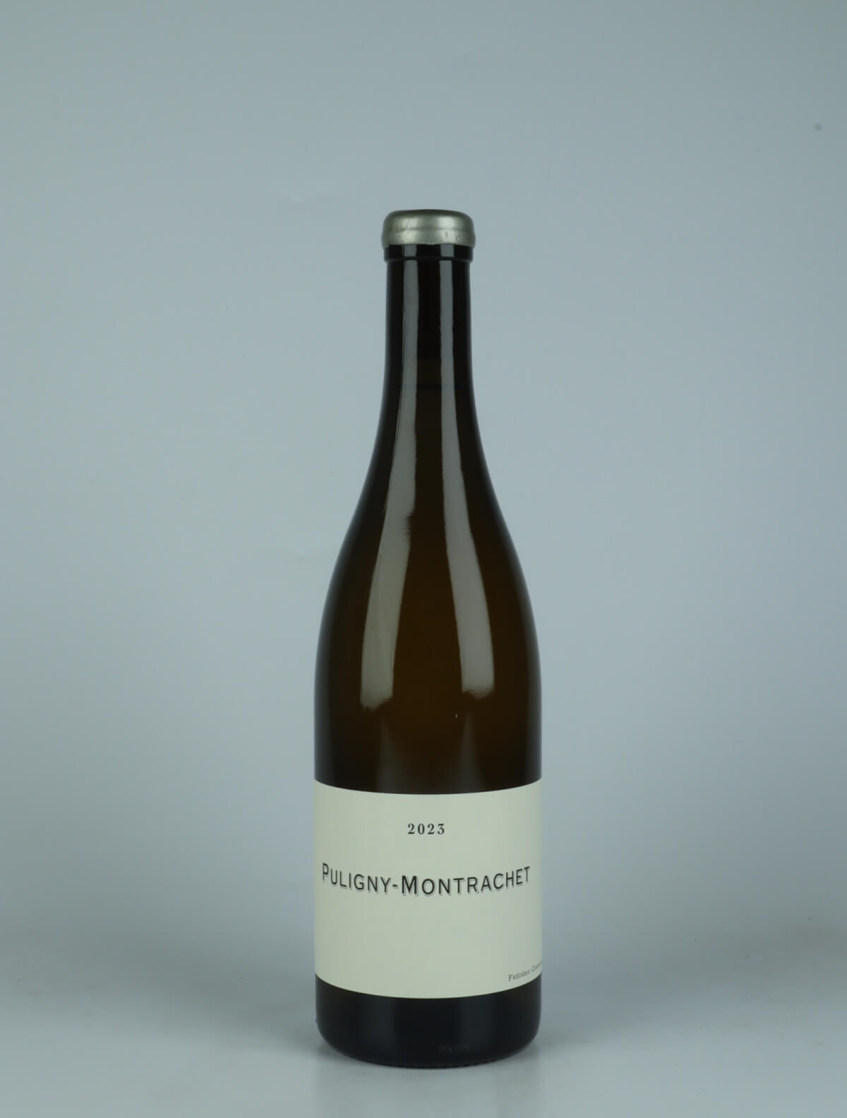 A bottle 2023 Puligny Montrachet White wine from Frédéric Cossard, Burgundy in France