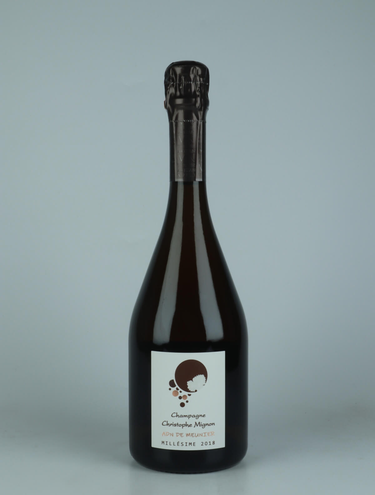 A bottle 2018 ADN de Meunier Millesime Brut Nature Mousserende from Christophe Mignon, Champagne in Frankrig