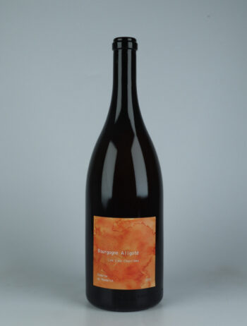 A bottle 2023 Bourgogne Aligoté - Macération - Les Eaux Charriées - Magnum Orange wine from Domaine de Mandelot, Burgundy in France