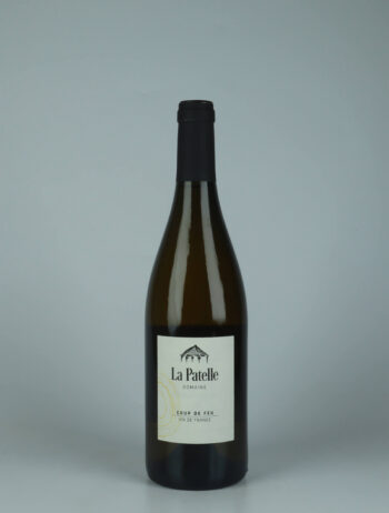 A bottle 2023 Coup de Feu - Chardonnay White wine from Domaine de La Patelle, Jura in France