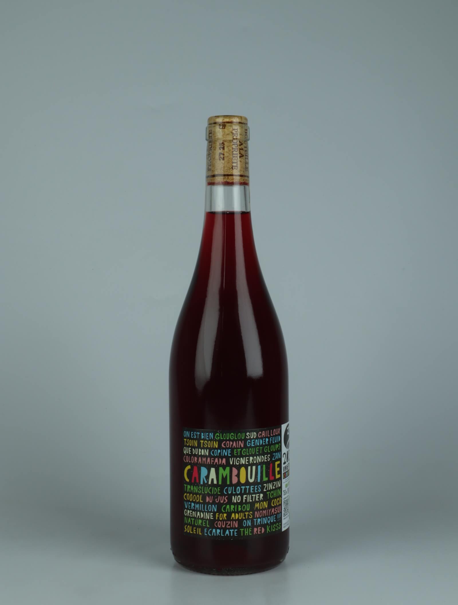 A bottle 2024 Carambouille Red wine from Les Vignerons d’Estézargues, Rhône in France