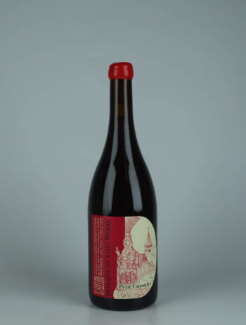 A bottle 2024 Arbois Rouge - Petit Curoulet Red wine from Domaine de Saint Pierre, Jura in France