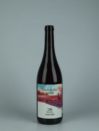 A bottle 2025 Cala Niuru - Rosso Red wine from Il Mortellito, Sicily in Italy