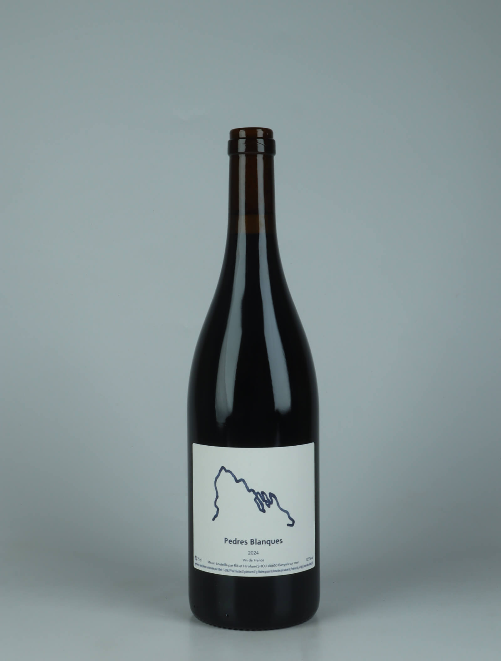 A bottle 2024 Rouge Red wine from Pedres Blanques, Roussillon in France