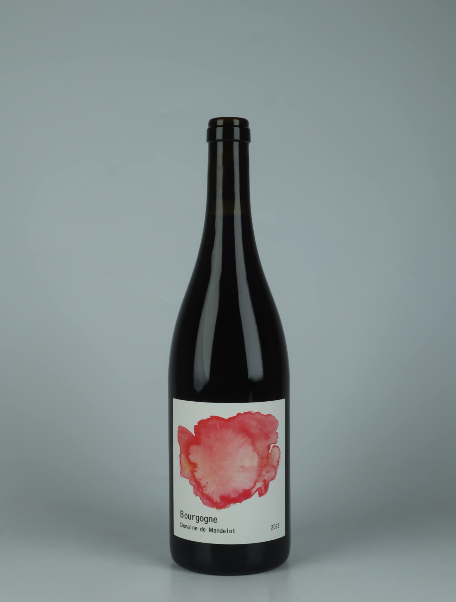 A bottle 2025 Bourgogne Rouge Red wine from Domaine de Mandelot, Burgundy in France
