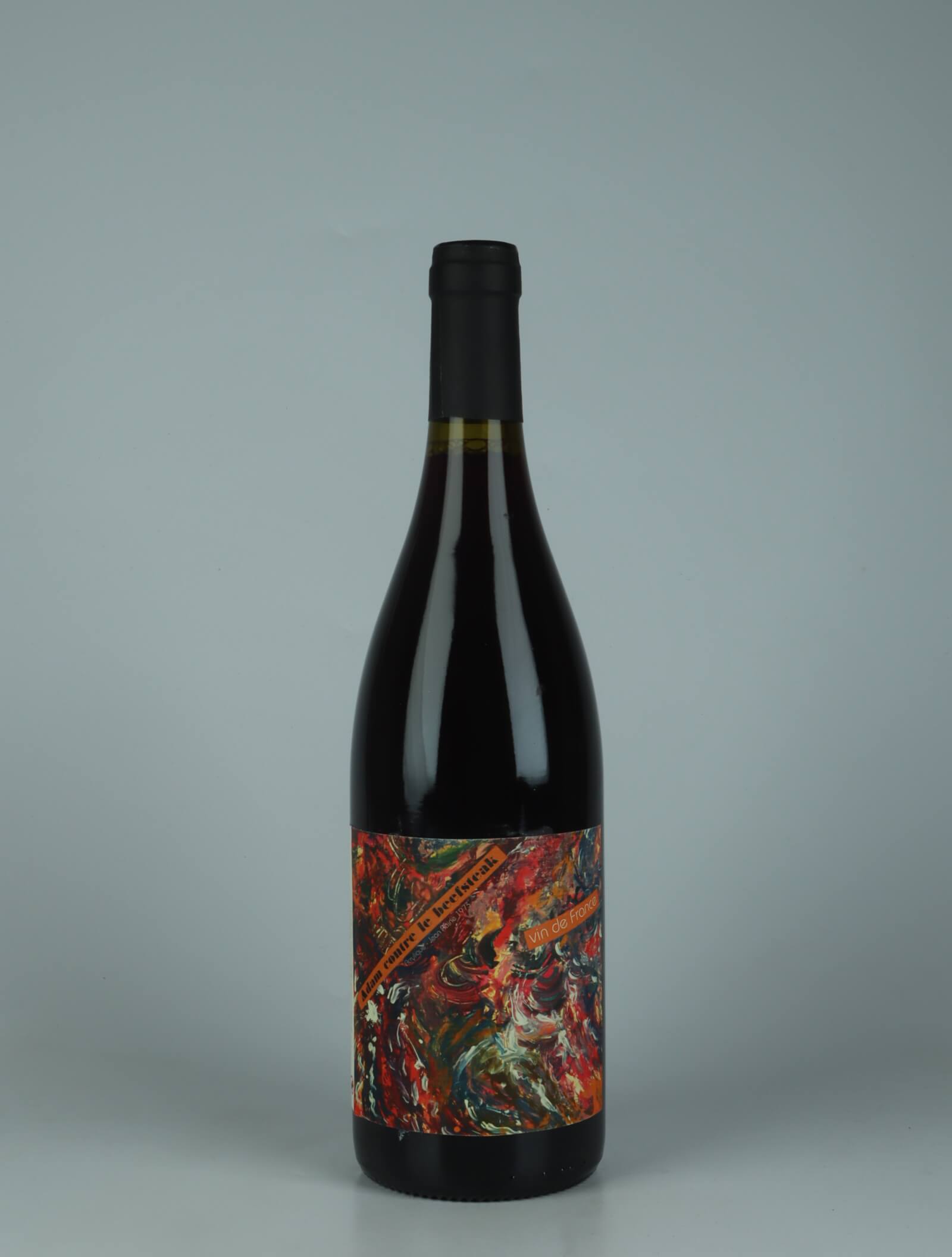 A bottle 2022 Adam Contre le Beefsteack Red wine from Daniel Sage, Haute-Loire in France