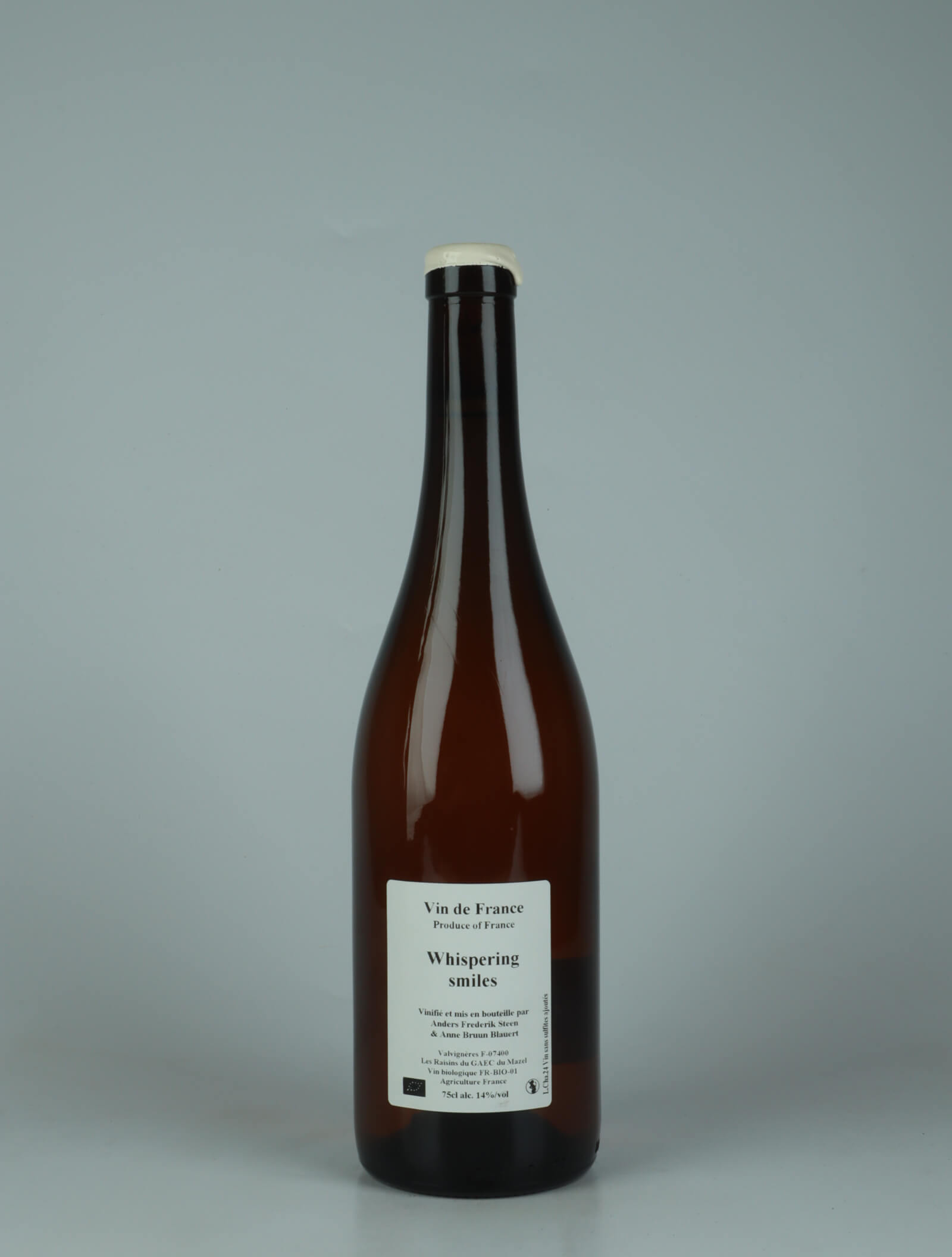 A bottle 2024 Whispering smiles White wine from Anders Frederik Steen & Anne Bruun Blauert, Ardèche in France