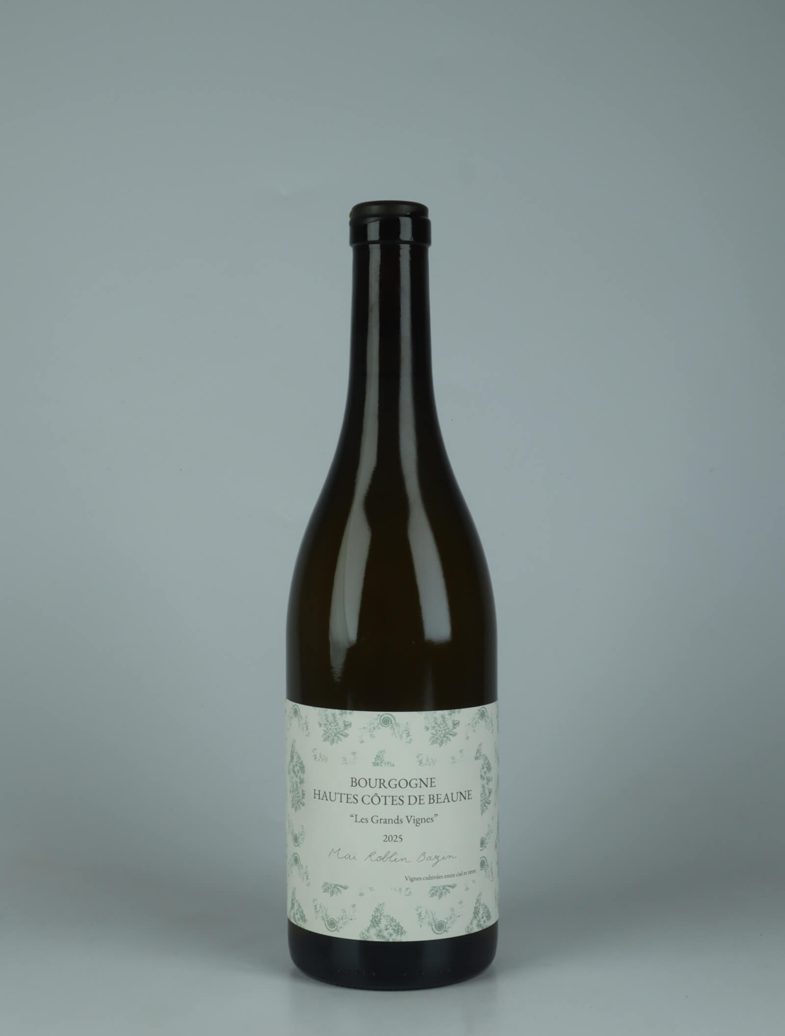 A bottle 2025 Hautes Côtes de Beaune - Les Grands Vignes White wine from Maï Roblin Bazin, Burgundy in France